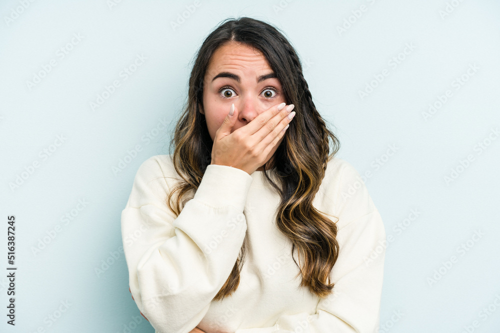 Young caucasian woman isolated on blue background scared and afraid. Young caucasian woman isolated on blue background scared and afraid.