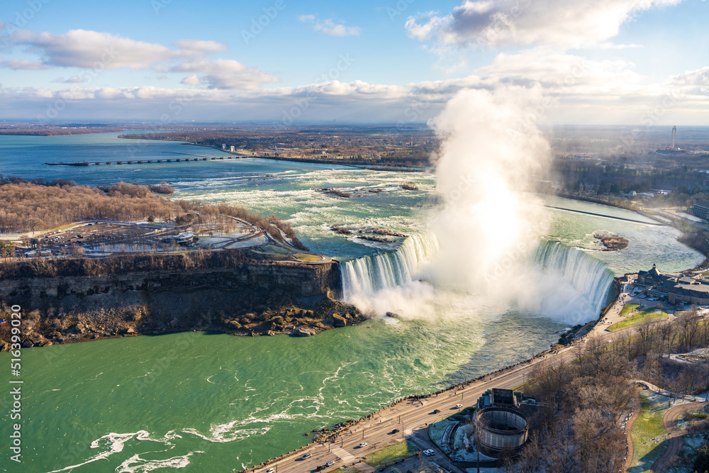 Overlooking the Niagara River Horseshoe Falls in a sunny day.