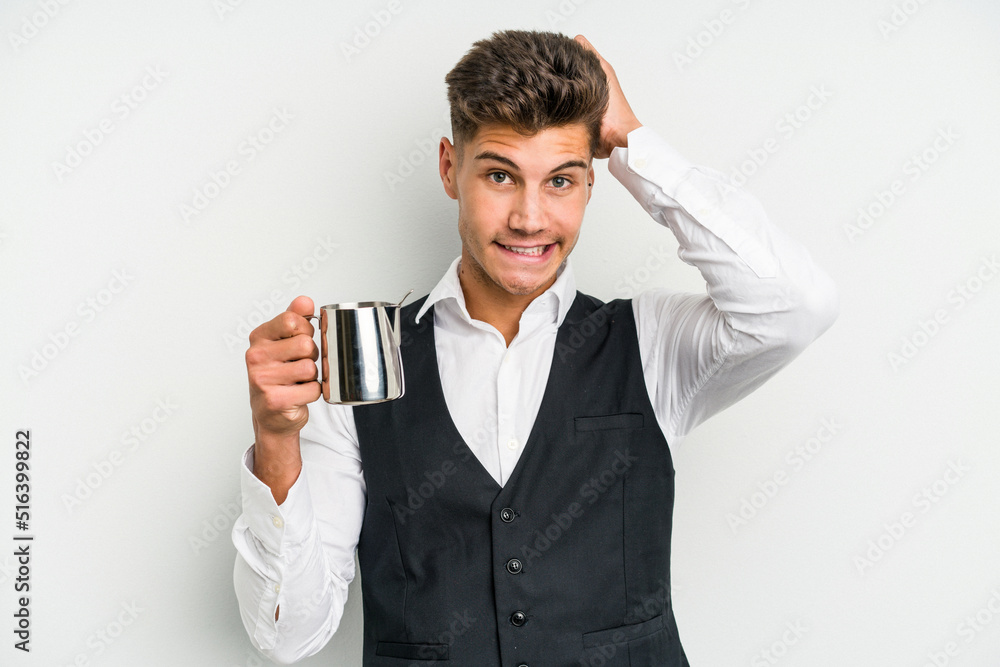 Young caucasian barista man isolated on yellow background being shocked, she has remembered important meeting. Young caucasian barista man isolated on yellow background being shocked, she has remembered important meeting.