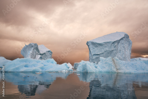 Antartica scenary beautifully combining mountains with sea and icebergs