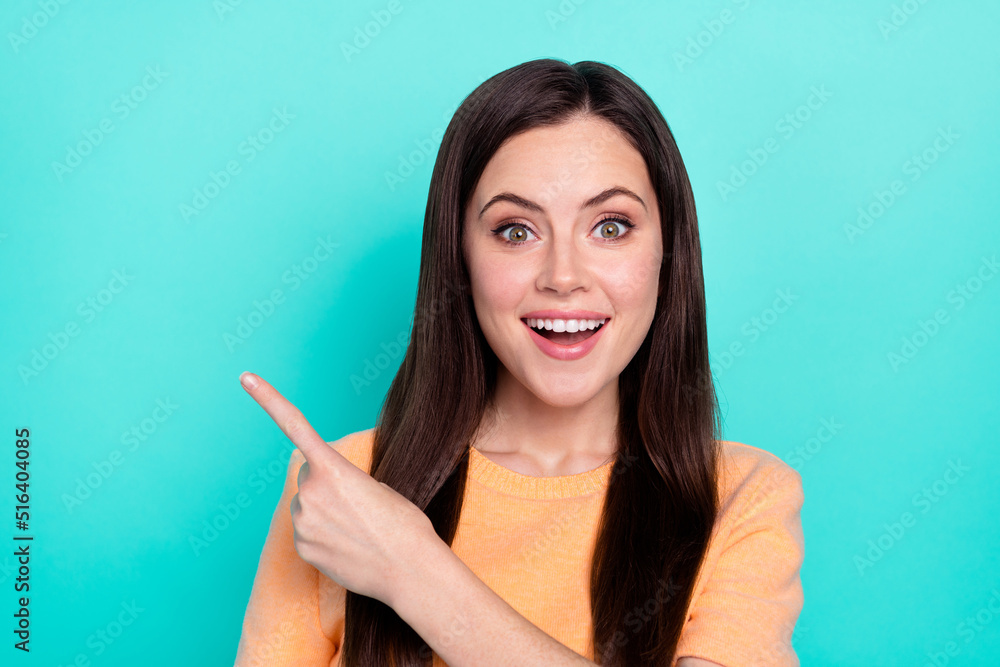 Portrait of cheerful pretty lady indicate finger empty space proposition blank isolated on turquoise color background Portrait of cheerful pretty lady indicate finger empty space proposition blank isolated on turquoise color background