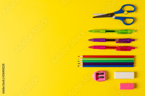 Image of school drawing tools on yellow surface with copy space