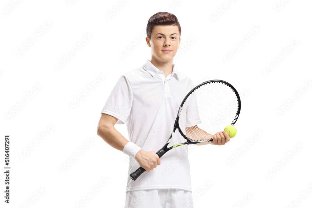 Young male tennis player standing and holding a ball and a racket Young male tennis player standing and holding a ball and a racket