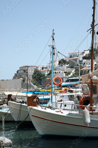 Beautiful view of coastal city with different boats on sunny day © New Africa