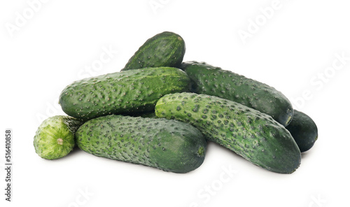 Heap of fresh ripe cucumbers on white background