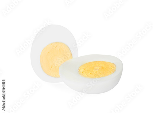 Halves of fresh hard boiled egg on white background