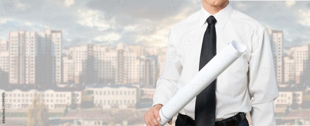 Young architect man with abstract building city backgrounds Young architect man with abstract building city backgrounds