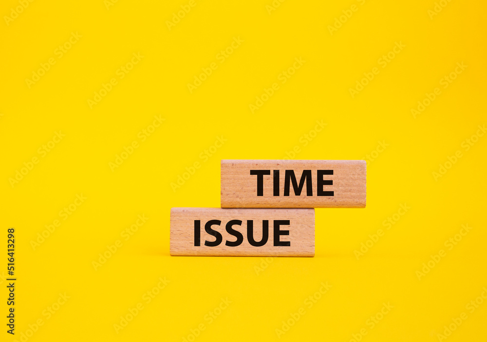 Time issue symbol. Wooden blocks with words Time issue. Beautiful yellow background. Business and Time issue concept. Copy space. Time issue symbol. Wooden blocks with words Time issue. Beautiful yellow background. Business and Time issue concept. Copy space.