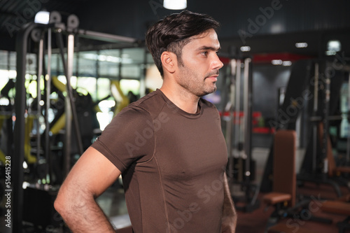 Portrait handsome caucasian sport man at fitness gym 