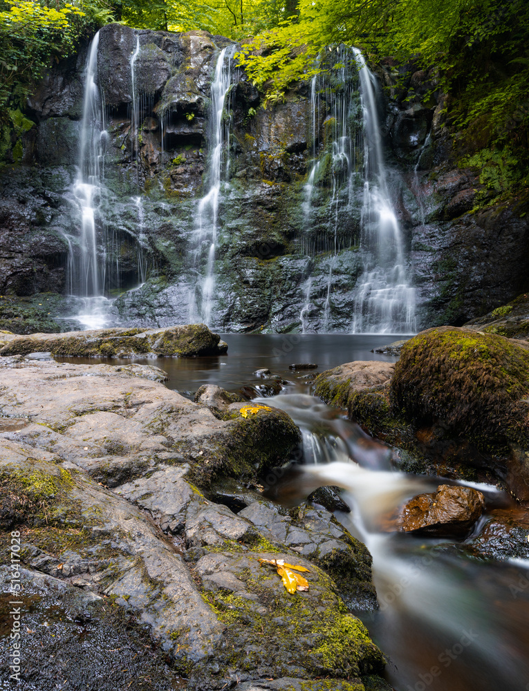 Fototapeta premium view of the Ess-Na-Crub Waterfall in the Glenariff Nature Reserve