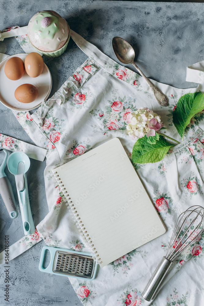 recipe book mockup on kitchen table with kitchen utensils in vintage