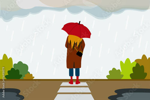 A lonely girl with an umbrella in the rain stands alone on the street. The concept of mental health problems, grief, suffering