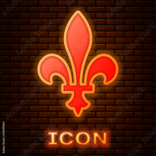 Glowing neon Fleur De Lys icon isolated on brick wall background. Vector