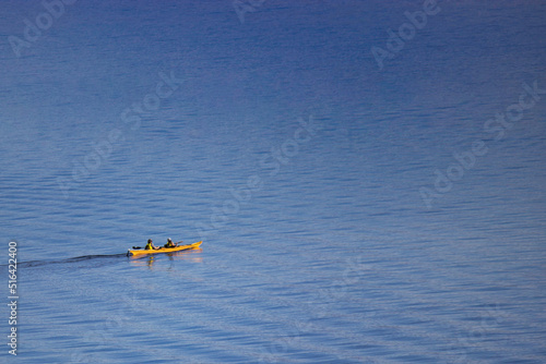 yellow kayak on the lake minimalism