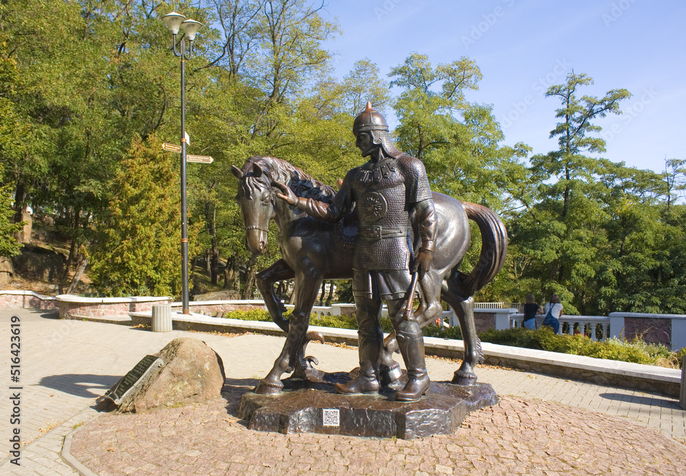 Monument to Dobrynya Nikitich with a horse in Drevlyanskiy park in Korosten, Ukraine	
