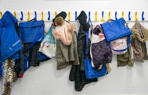 Foto Rack of coats on pegs