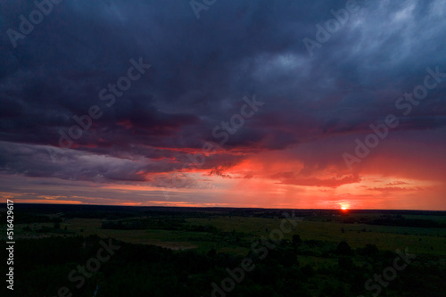 red sunset in storm clouds
