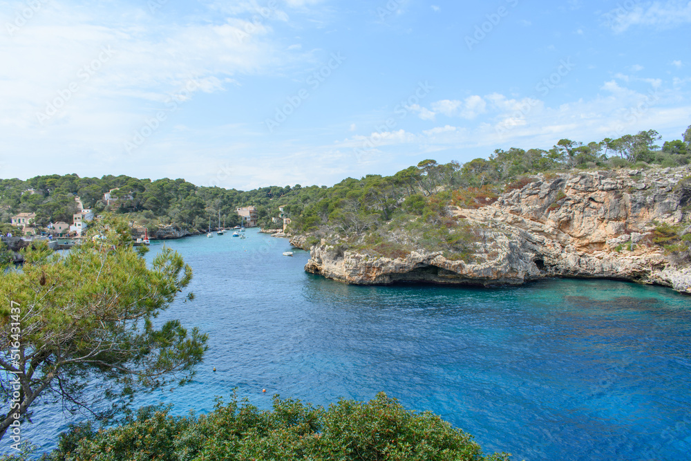 Turquoise water and coastal cliffs in Cala Figuera, Mallorca, Spain