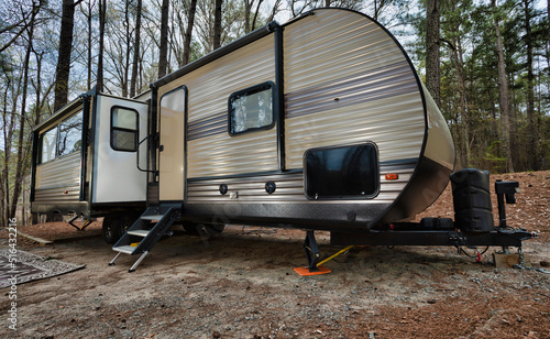 Camping trailer in a North Carolina forest © Guy Sagi