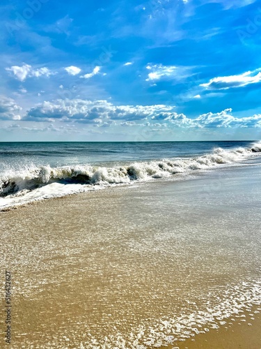 Vertical of sea waves at the shore in Cape May Point State Park, New Jersey photo