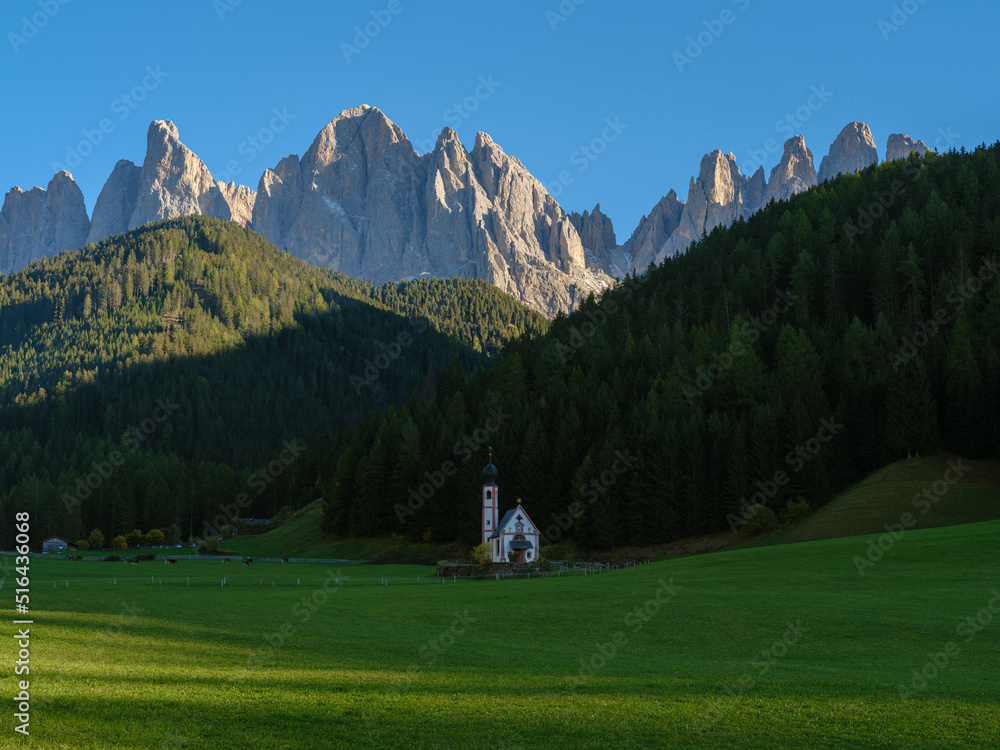 Traditional alpine St Johann church in Val di Funes valley, Santa Maddalena. Dolomites, Italy, Europe