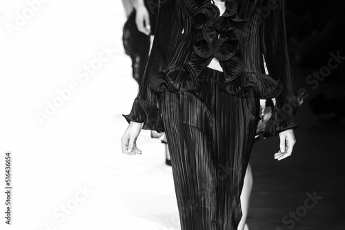 Fashion Show, CatwalkFashion catwalk runway event, model walking the show finale.