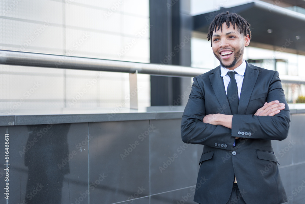 Fototapeta premium african businessman in suit at street