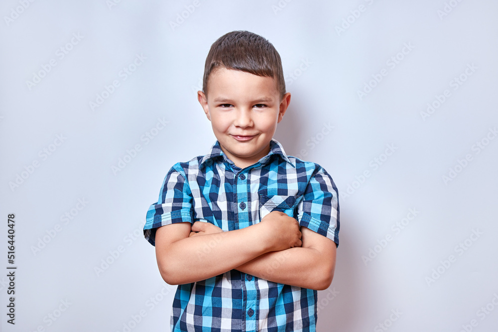 Handsome, smiling boy with crossed arms. Handsome, smiling boy with crossed arms.