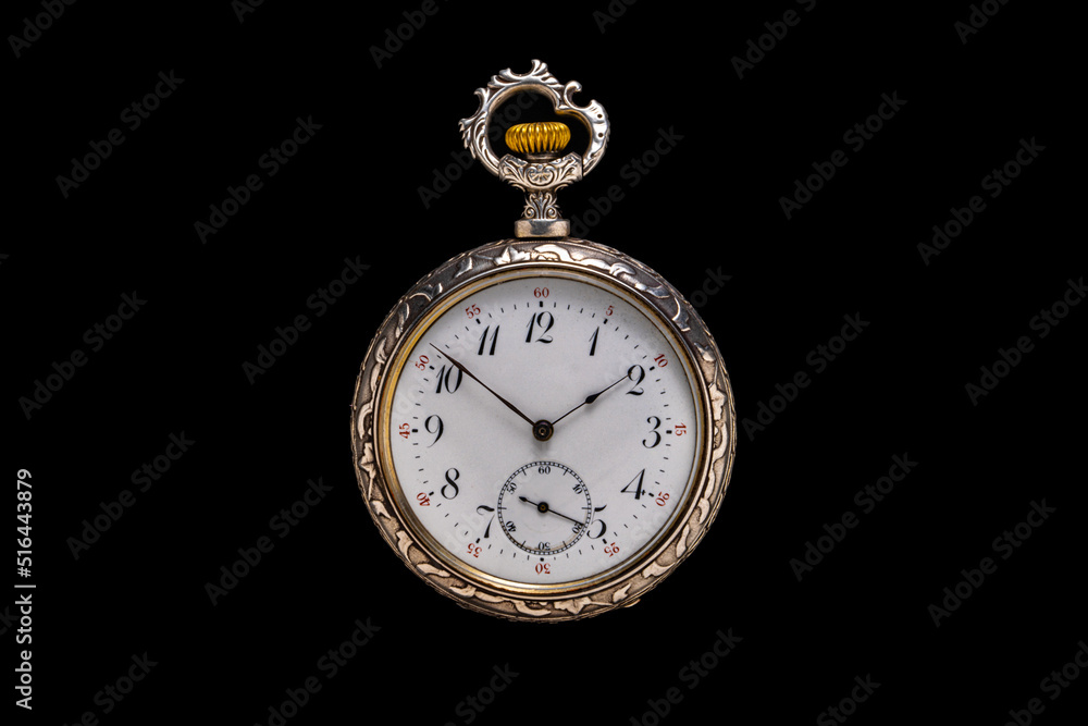 Silver mechanical antique pocket watch on black isolated background. Retro pocketwatch with second, minute and hour hand. Old round clock with dial for gentleman. Vintage timepiece. Silver mechanical antique pocket watch on black isolated background. Retro pocketwatch with second, minute and hour hand. Old round clock with dial for gentleman. Vintage timepiece.