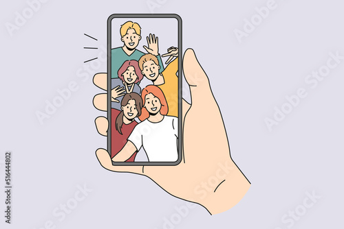 Person hold smartphone talk on video call with diverse friends. Man use cellphone have online webcam chat or communication on gadget with international mates. Vector illustration. 