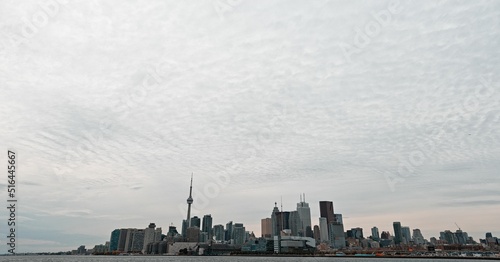 Photography Low angle shot of Toronto cityscape, Canada under a cloudy sky