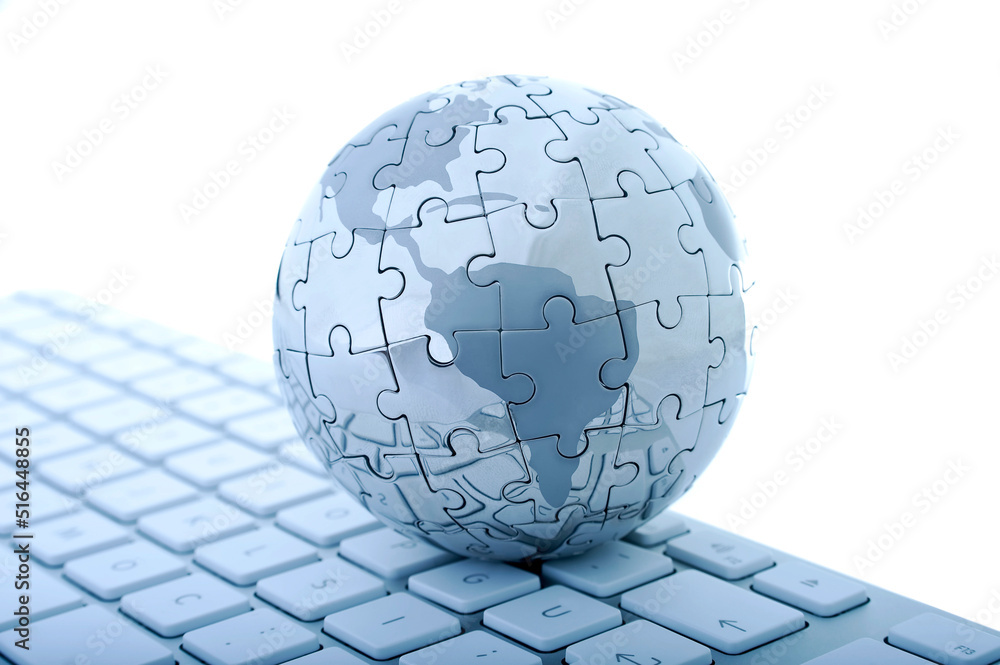 Globe Jigsaw Puzzle with Keyboard on Isolated White Background Globe Jigsaw Puzzle with Keyboard on Isolated White Background