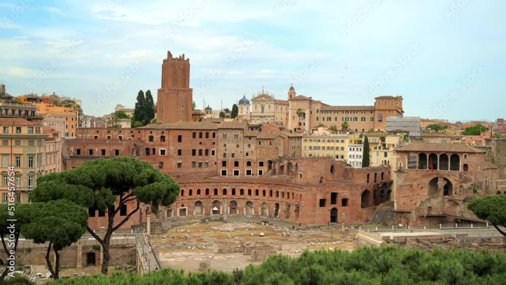 Timelapse view of the Roman Forum in Rome, Italy. Ancient excavations with old buildings on the background, walking people