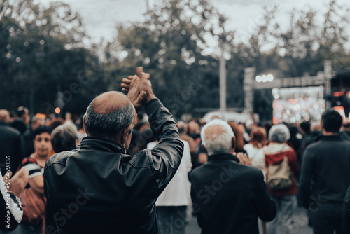 people in demonstration or a concert