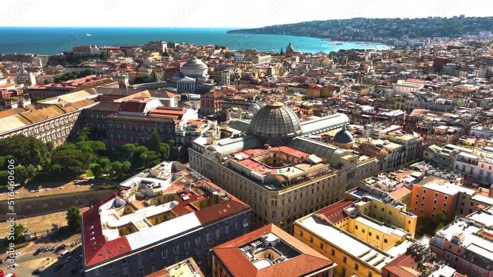 epic wide drone shot of naples, italy during the summer showing ancient city and buildings epic wide drone shot of naples, italy during the summer showing ancient city and buildings