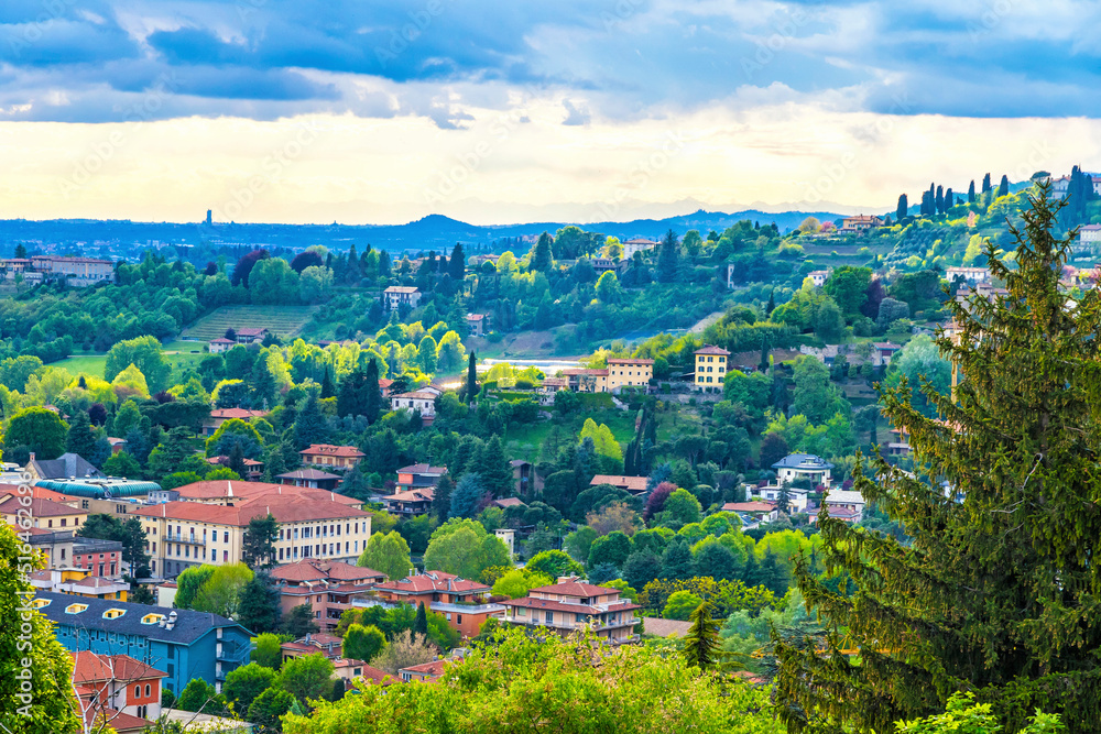 Picturesque aerial spring view of outskirts of Bergamo city, Italy. View from Parco di San Giovanni