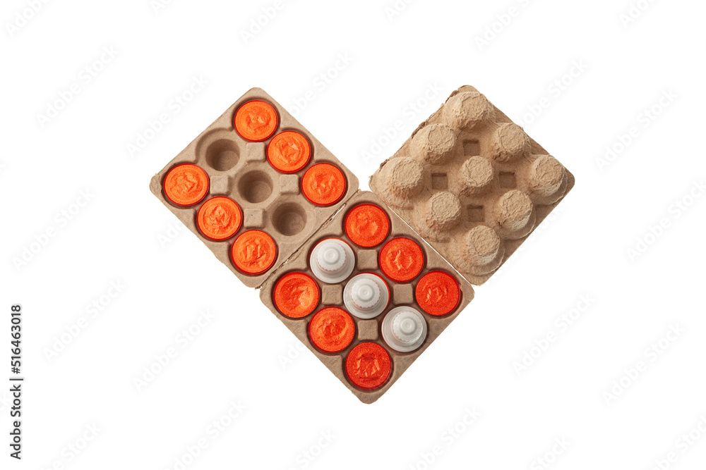 Coffee capsules in folding paper box. Eco-friendly packaging made of recycled waste paper for coffee capsules. Modern trend. Reuse of packaging Coffee capsules in folding paper box. Eco-friendly packaging made of recycled waste paper for coffee capsules. Modern trend. Reuse of packaging