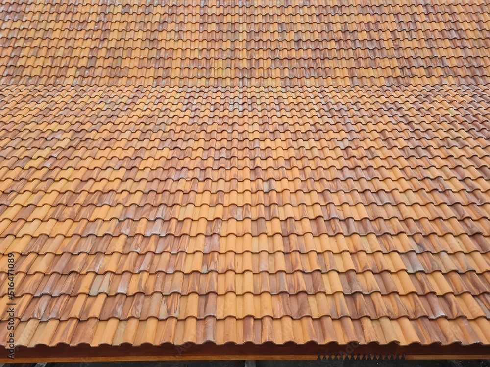 Tile roofs, patterns of blue sky. copy space.