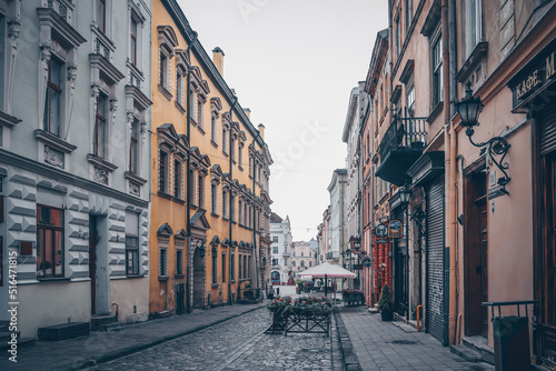 Traditional buildings in a cobblestone street in historical Old town of Lviv.