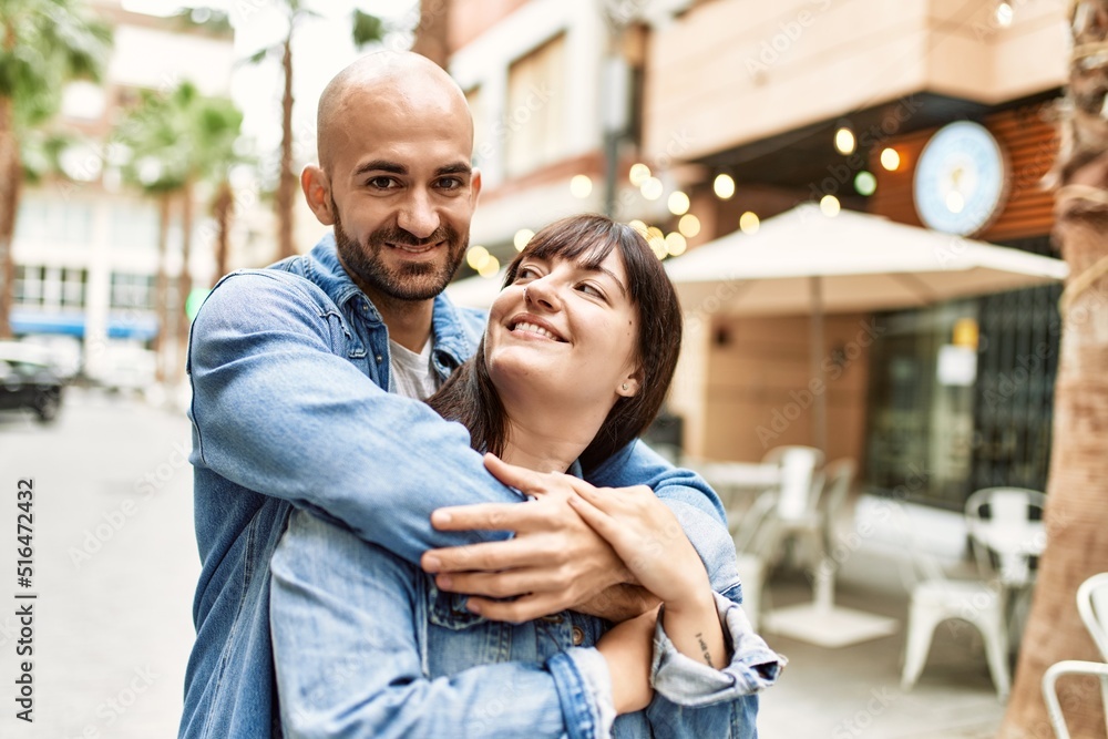 Young hispanic couple smiling happy standing at the city. Young hispanic couple smiling happy standing at the city.