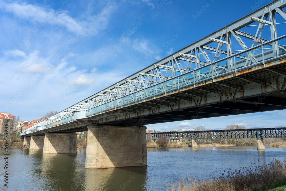 Old train Iron bridge over Duero river in Zamora. Spain.