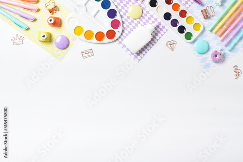 Top view of various stationery lying on a white background. Copy space. Flat lay, top view