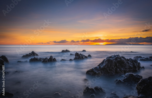 Sunrise on Reis Magos beach. Canico, Madeira, Portugal. October 2021. Long exposure picture