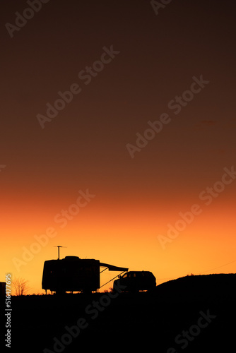 Tablou canvas Caravans at Sunset, Long Waterhole free camping