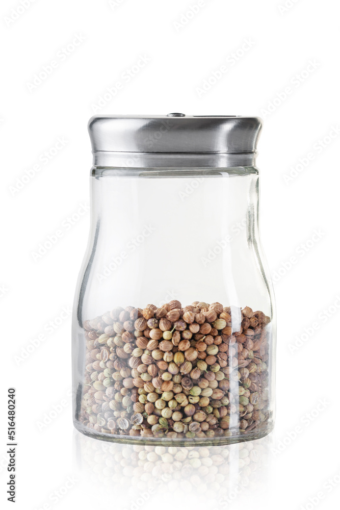 Jar with coriander on a white background. Jar with coriander on a white background.