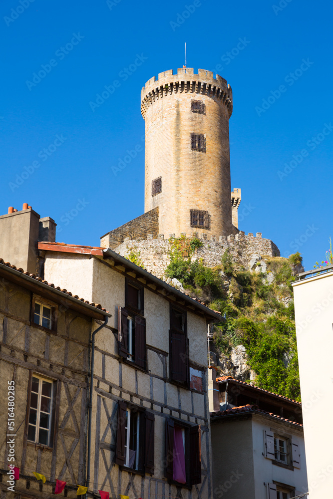 Obraz premium View from city streets on towers of medieval fortress Chateau de Foix, France..
