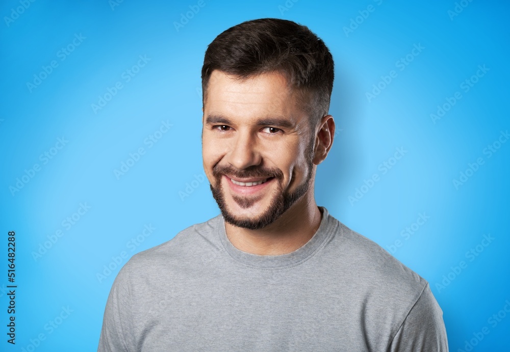 Happy man posing on the color background Happy man posing on the color background