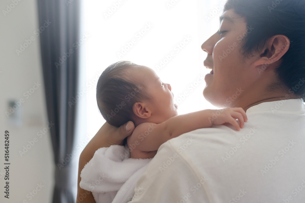 Young father with a Cute new born baby. Young father with a Cute new born baby.