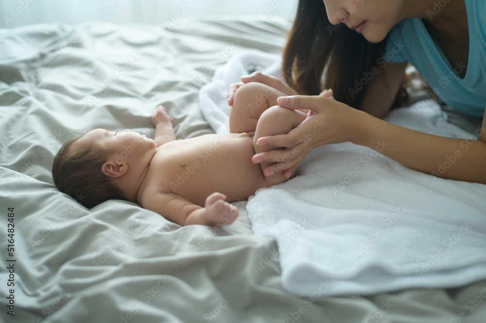 Young mother with a Cute new born baby. Young mother with a Cute new born baby.
