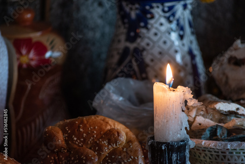Mexican offering of the day of the dead with bread and local crafts. 